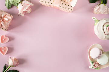 Copy space for your text on a light pink background with pink roses. flat lay, Top view