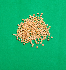 Healthy millet seeds - Green background