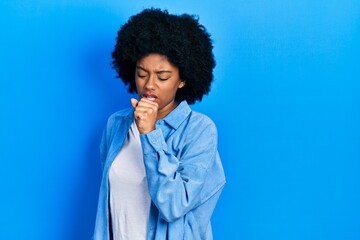 Fototapeta na wymiar Young african american woman wearing casual clothes feeling unwell and coughing as symptom for cold or bronchitis. health care concept.
