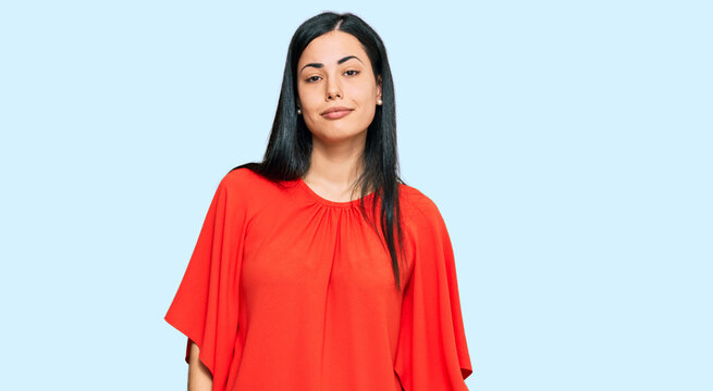 Beautiful young woman wearing casual clothes looking sleepy and tired, exhausted for fatigue and hangover, lazy eyes in the morning.