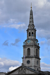 Fototapeta na wymiar St. Martin-in-the-Fields chapel and clock tower, Trafalgar Square, London, UK
