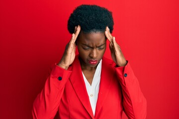 Young african american girl wearing business clothes with hand on head for pain in head because stress. suffering migraine.