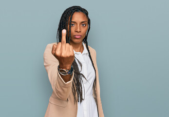 African american woman wearing business jacket showing middle finger, impolite and rude fuck off...
