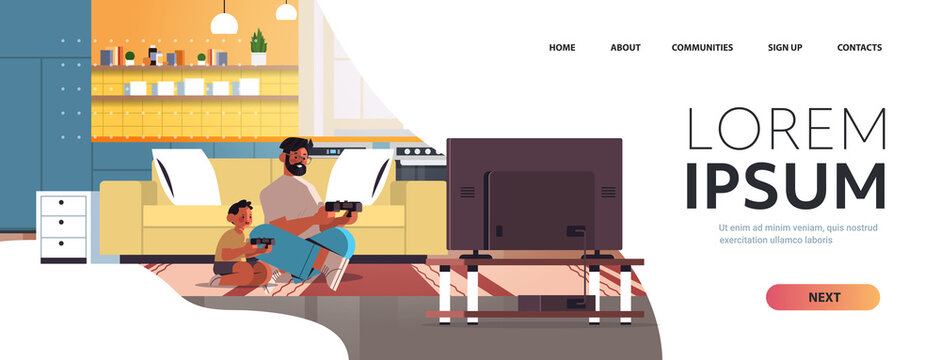 young father playing video games on game console with little son at home parenting fatherhood concept