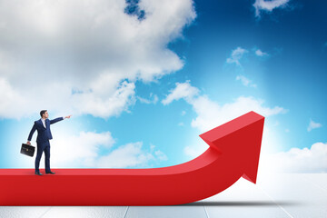 Businessman in economic growth concept