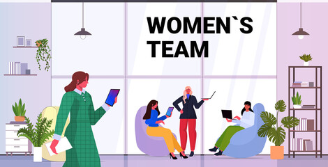 businesswomen using digital gadgets successful business women team working together leadership concept