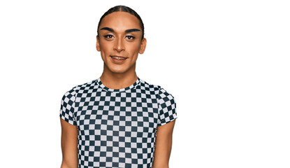 Hispanic transgender man wearing make up and long hair wearing modern clothes with a happy and cool smile on face. lucky person.