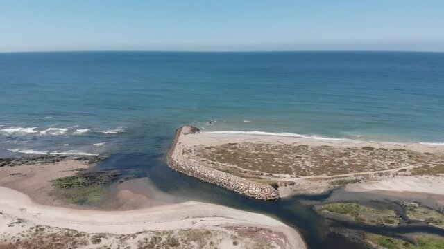 DRONE AERIAL FOOTAGE: The mouth and estuary of Neiva River in Castelo do Neiva, Viana do Castelo, Portugal. 