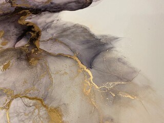 Abstract pink art with gold — pink-purple background, beautiful smudges and stains made with...