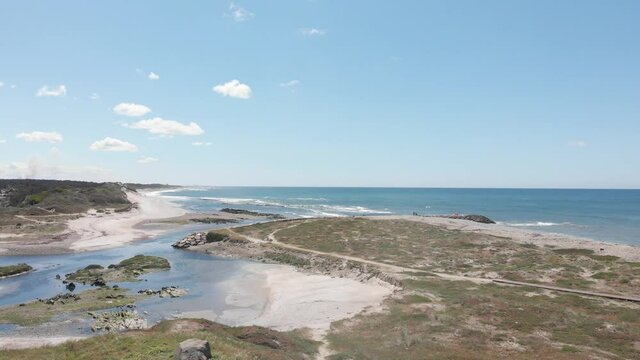DRONE AERIAL FOOTAGE: The mouth and estuary of Neiva River in Castelo do Neiva, Viana do Castelo, Portugal.