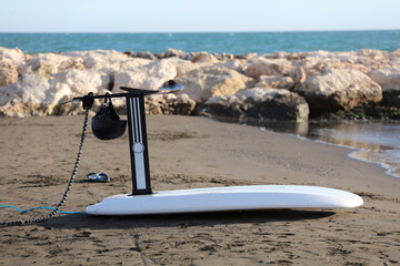 foilboard in the sand on the beach