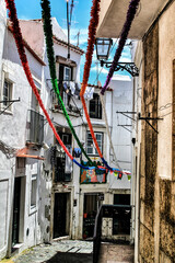 Streets adorned with garlands in Alfama, Lisbon
