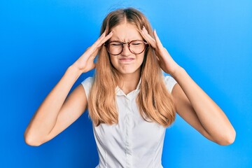 Beautiful young caucasian girl wearing casual clothes and glasses with hand on head, headache because stress. suffering migraine.