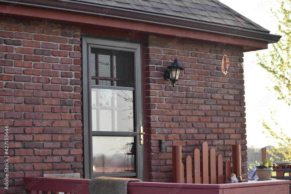 Wall mural Door on a Brick House