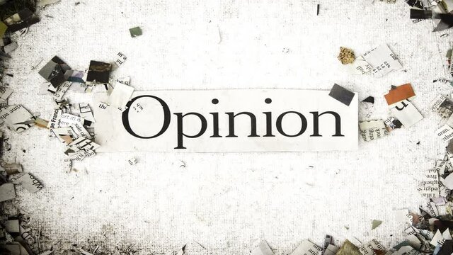 the word Opinion being covered with cut-up newspaper stop motion loop 