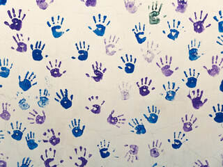 Fototapeta premium colorful hands painted on school wall, creativity concept