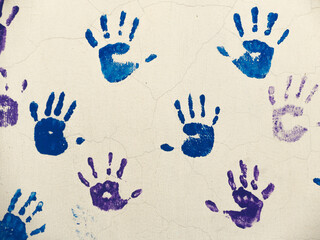 colorful hands painted on school wall, creativity concept