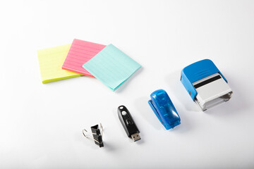 Fototapeta premium Neon colored office stationary supplies on white background.