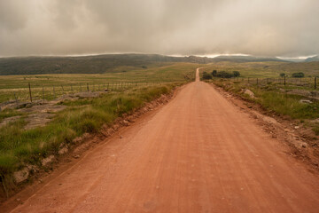 rural road, cloudy sky