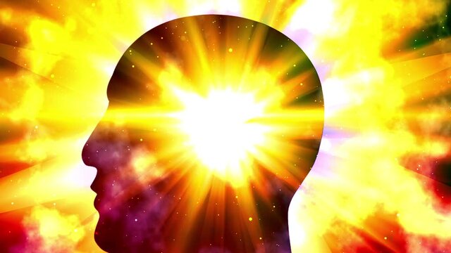 Silhouette of human head with light flare effect
