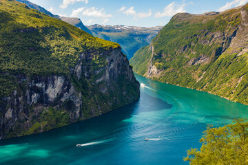 Fjord Geirangerfjord with boats, Norway.