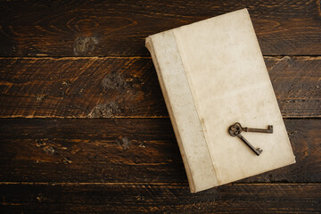 Fototapeta premium Old books and vintage keys. Books are the key to opening the doors of knowledge.