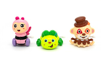 Plastic bee, bug and octopus toy isolated in white background.