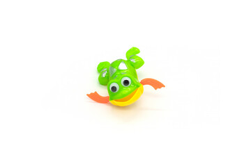 Fototapeta premium Plastic frog toy isolated white.