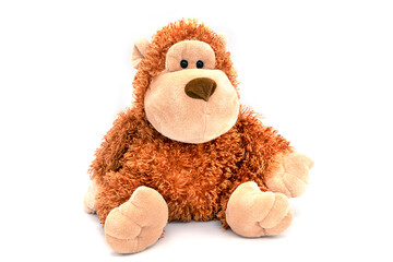 Plush toy monkey isolated on white.