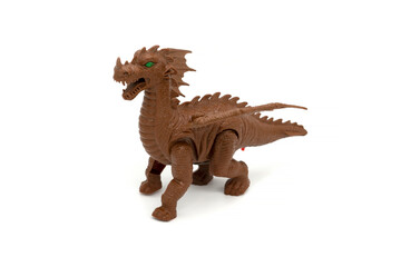 Plastic dinosaur toy isolated on white background