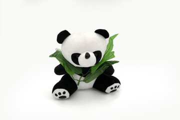 Stuffed panda toy isolated white.