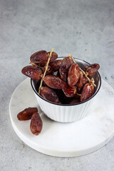 Kurma or delicious dried dates  isolated on white.