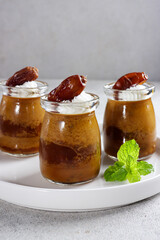 Agar-agar kurma, puding kurma or dates pudding, made of coconut milk, palm sugar and dates.
