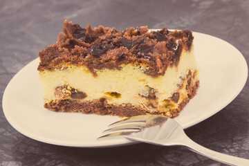 Piece of fresh cheesecake on plate. Delicious dessert