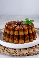 Agar-agar kurma, puding kurma or dates pudding, made of coconut milk, palm sugar and dates.