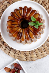 Agar-agar kurma, puding kurma or dates pudding, made of coconut milk, palm sugar and dates.