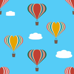 Multi-coloured hot air balloons and clouds seamless pattern on blue sky background
