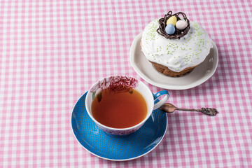 traditional Easter cakes decorated homemade pastry and cup of tea