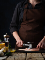 The chef hammers a chicken fillet for chops. Ingredients in the background. Meat recipes and illustrations for food book