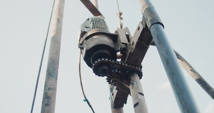 Drilling rig drills well for water extraction