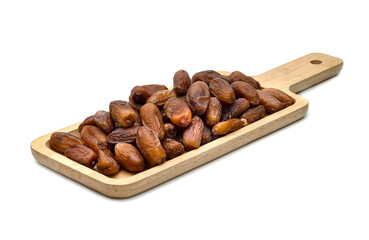 dry dates palm in wooden tray isolated on white background.