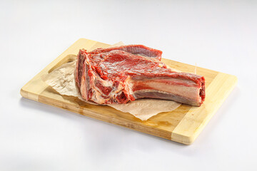 Raw bones for cooking over board