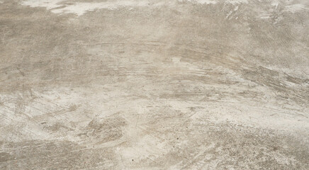 The rough and porous texture of the gray concrete wall, Black with brown and white abstract background