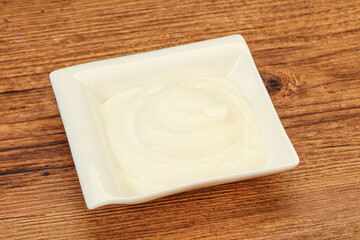 Sour cream in the bowl