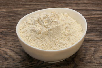 Wheat flour heap in the bowl