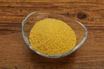 Raw cous cous heap in the bowl