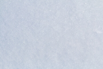 Winter snow. Snow texture Top view of the snow. Texture for design. Snowy white texture. Snowflakes.