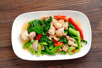 Stir-fried pork belly with kale Season with sugar, fish sauce and oyster sauce