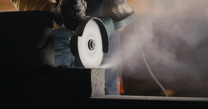 Crop builder cutting concrete block