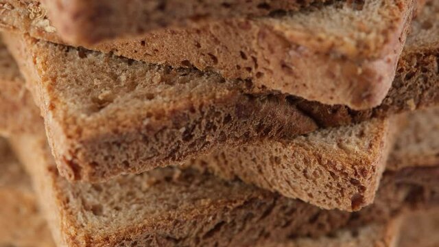 slices toast bread close up. the frame moves from bottom to top